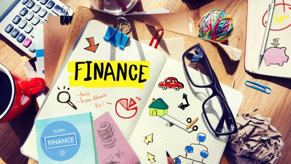 A notebook with finance written on it