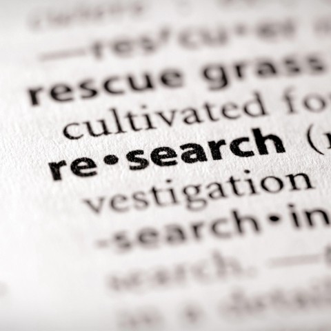 Decoratieve afbeelding met het woord research erop