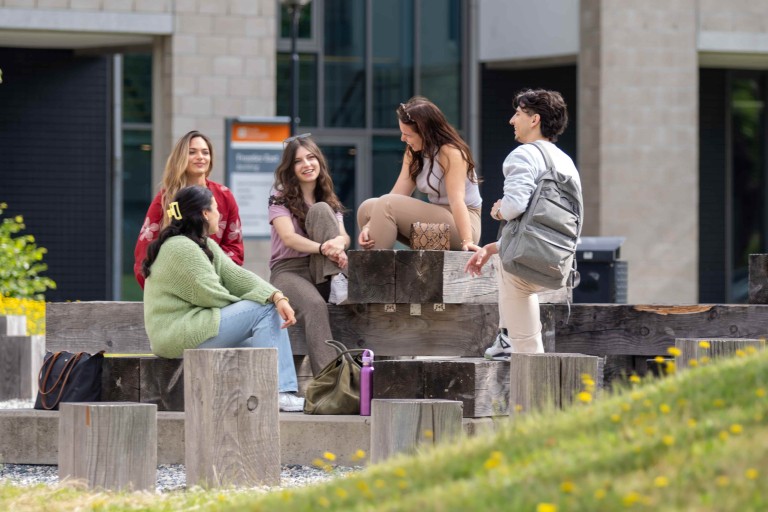 students outside relaxing on Dutch campus