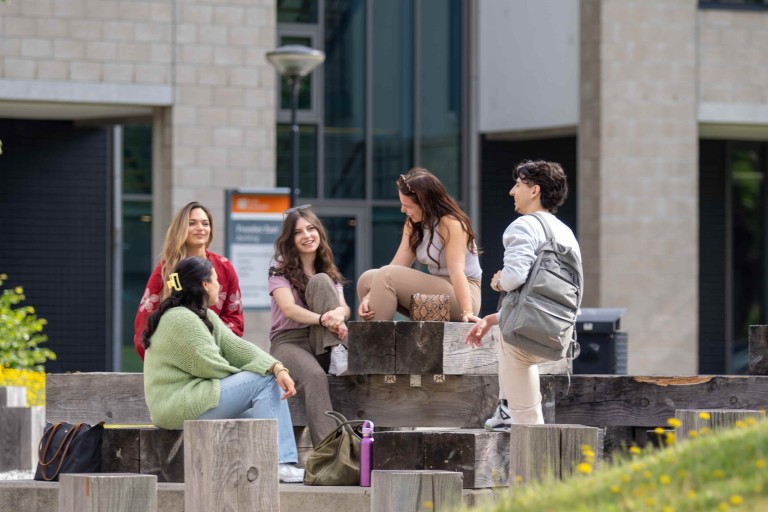 students outside relaxing on Dutch campus