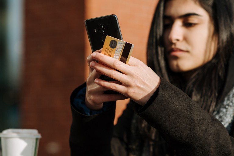 person paying with a card