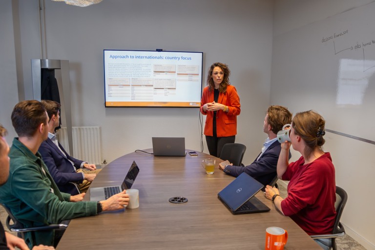 multiple people in a meeting room