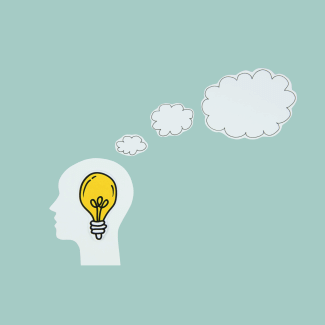 brain with light bulb and thought clouds