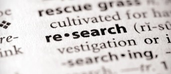 Decoratieve afbeelding met het woord research erop